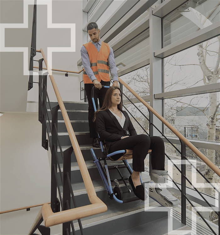 Evacuation chair being used on stairs